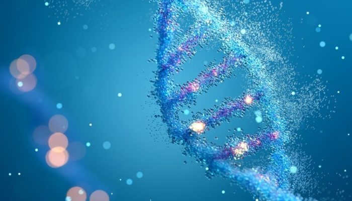 A DNA double helix structure made of glowing particles against a blue background.