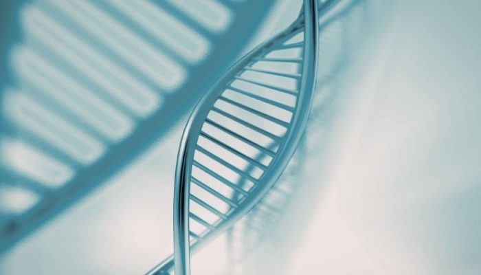 A double helix DNA strand illustration with a blurred background.