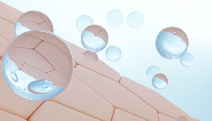 A clear illustration of collagen biostimulation with floating gel-like spheres and skin layers.